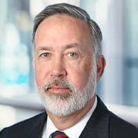 man in a suit looking at camera