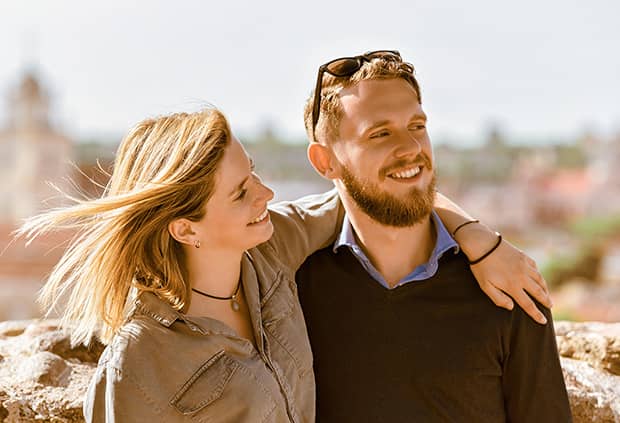 Brother and sister hugging