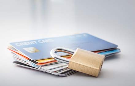 Credit cards with a closed lock. Protect your money concept.