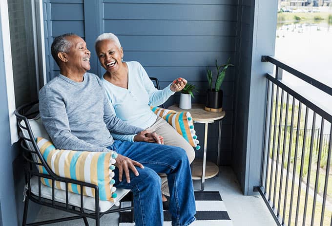 couple laughing on porch