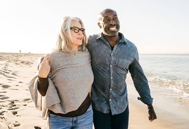 couple walking on a beach