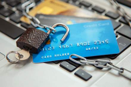 Credit cards with an open lock and chain. Protect your credit cards concept.