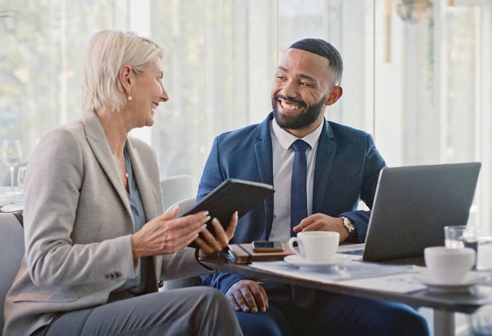 Financial professional meeting with business owner