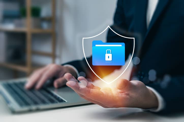Cybersecurity concept of a lock icon over a folder.