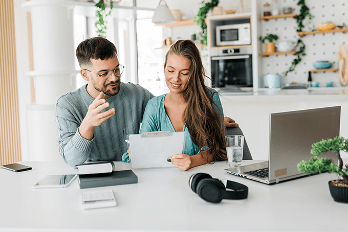 Young couple working at home
