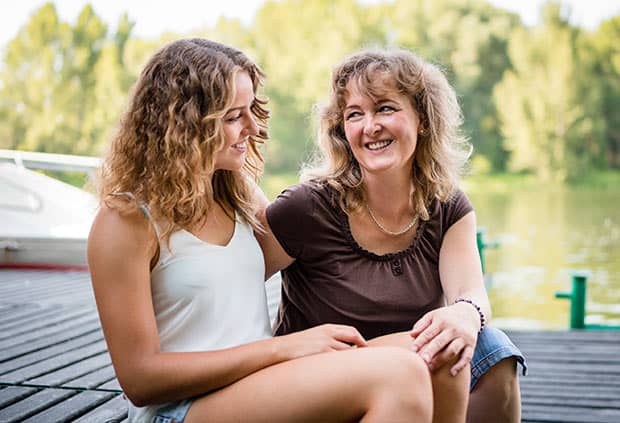 mother daughter on dock