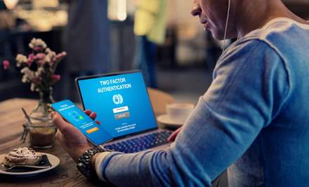 Person using two-factor authentication to Log In.