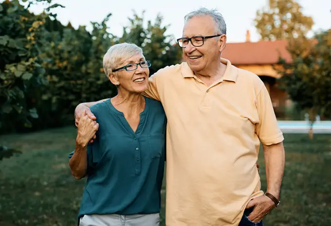 Retired couple enjoying financial security with SIUL