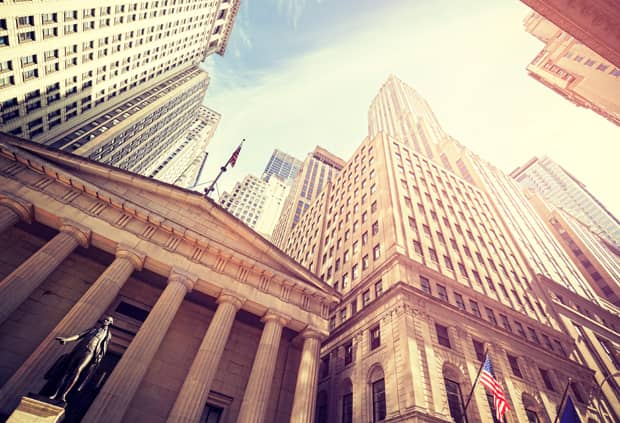 Vintage toned Wall Street at sunset, NYC