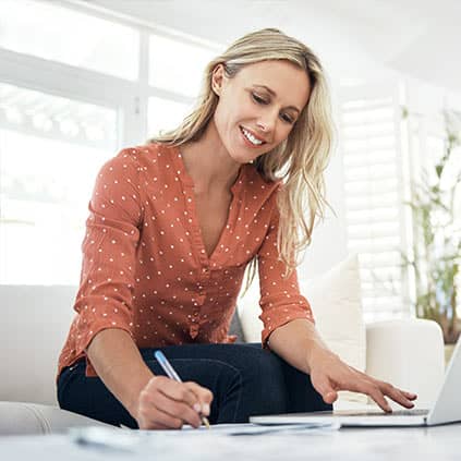 woman looking over finances