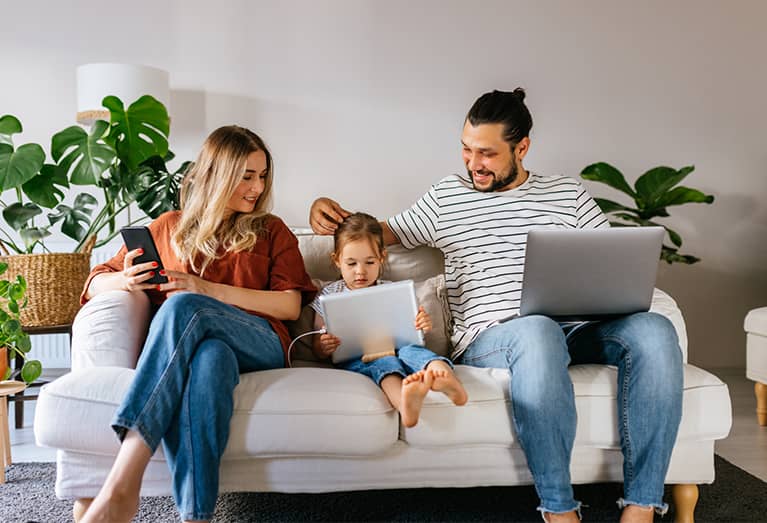 Young couple researching life insurance