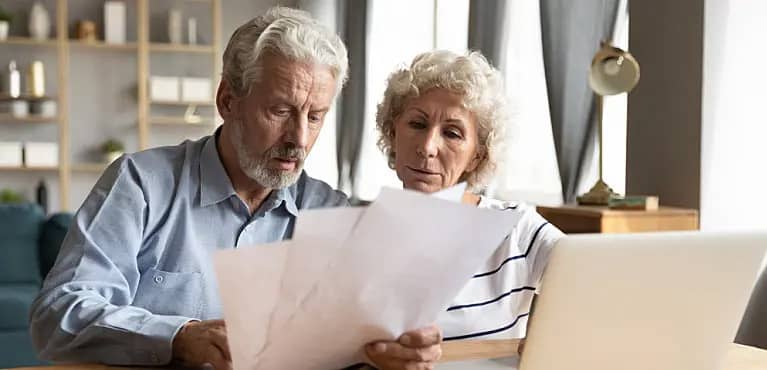 retired couple reviews whether they need supplemental insurance if they have medicare