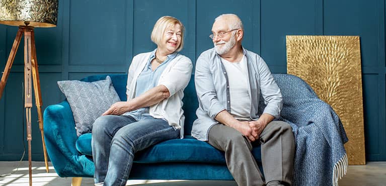 couple laughing on the couch