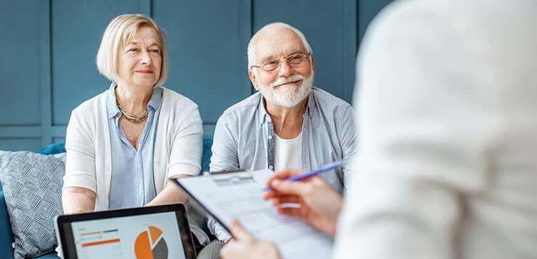 couple receiving financial wellness checkup