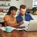 Couple reviewing budget and insurance needs