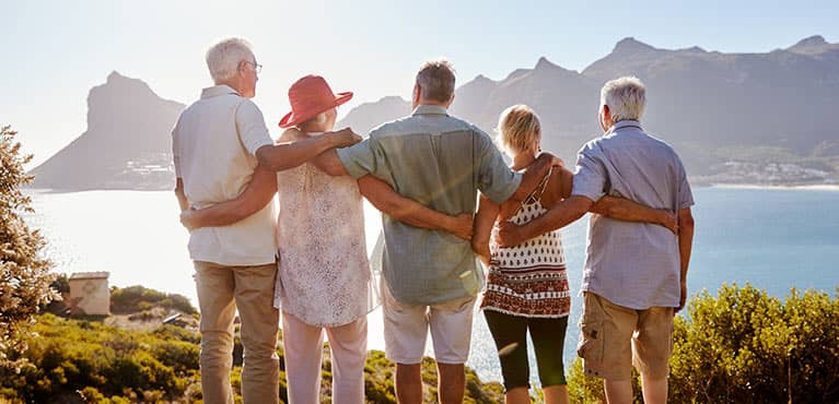 family enjoying view of the mountains