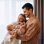 Young family thinking about affordable life coverage