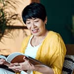 Woman reading about retirement income options