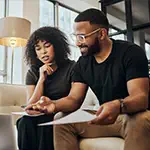Couple reviewing finances together