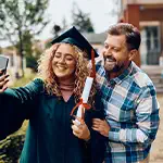 Father supporting his daughter in college