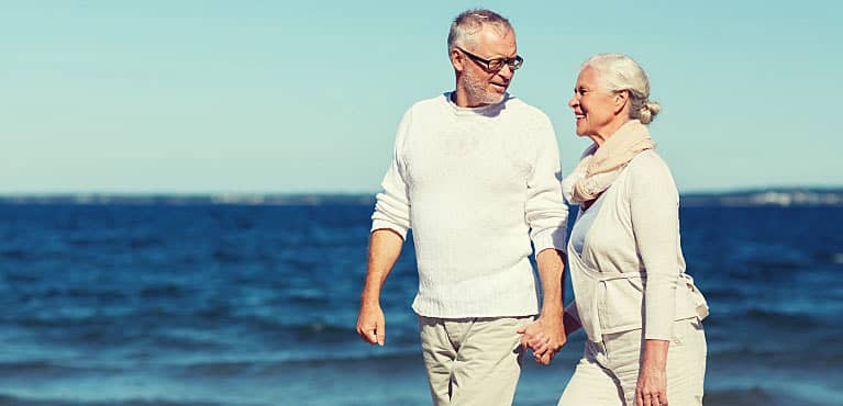 Senior couple knowledgeable about the difference medicare and medicaid