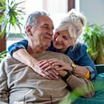 Wife hugging her husband