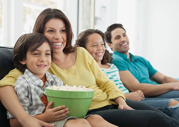 clic indexed universal life family eating popcorn