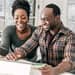 Couple reviewing their finances together