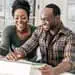 Couple reviewing their finances together