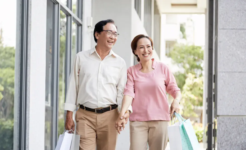 Happy couple shopping together