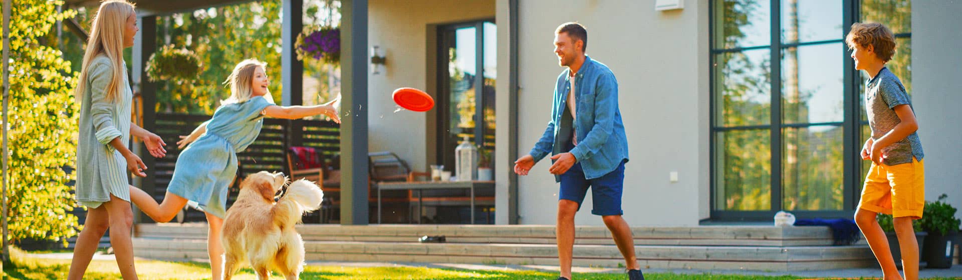 family playing frisbee