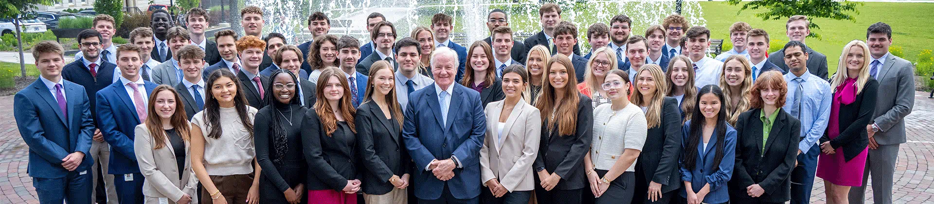 Group of student interns with John Barrett