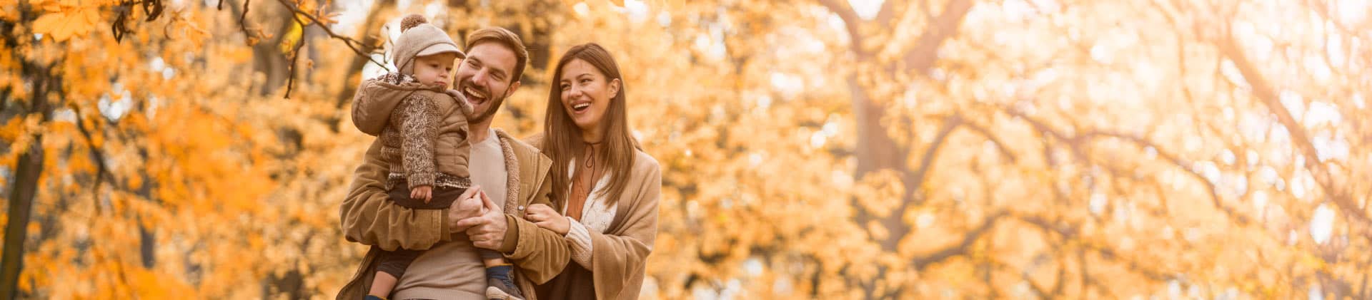 carefree family having fun while running in the park