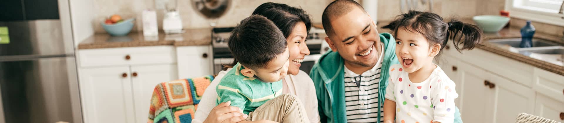 happy family protected by additional insurance