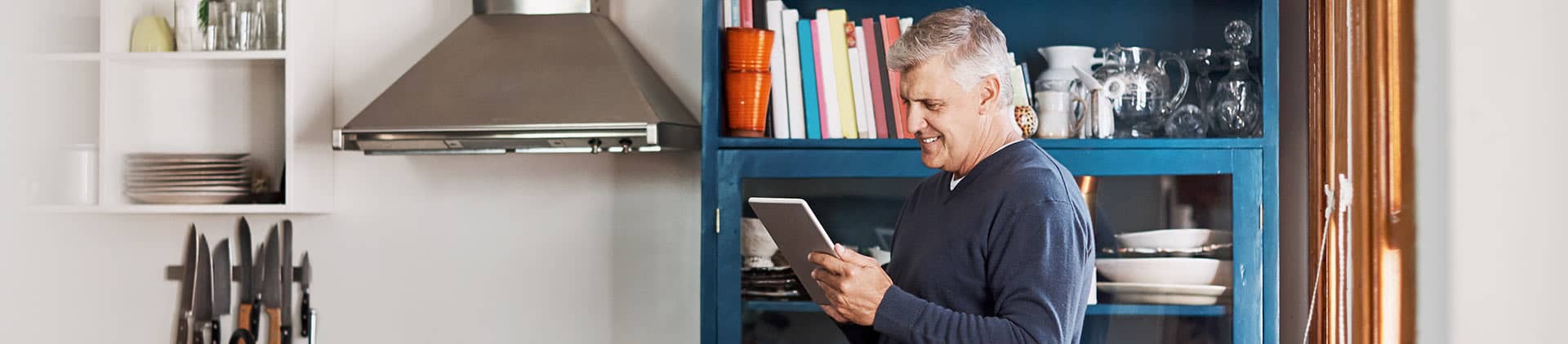 Gentleman using a notebook to check in daily performance numbers