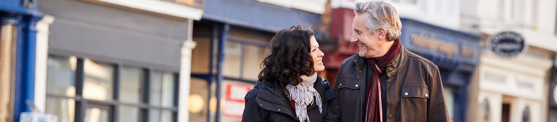 Couple enjoying a nice cool day shopping on main street
