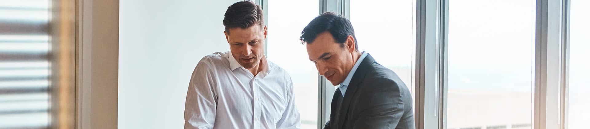 two men conducting business