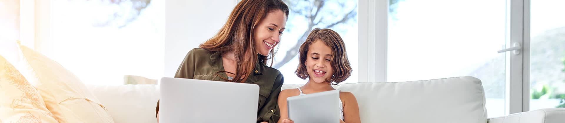 Mother and daughter on computer