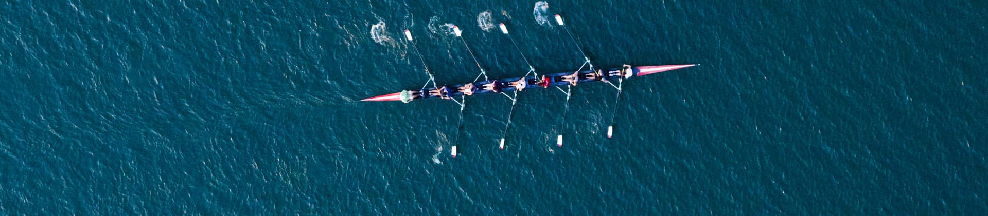 Rowing team in open water
