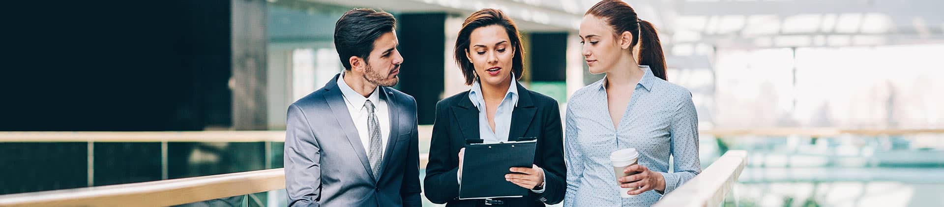 three young leaders discussing development