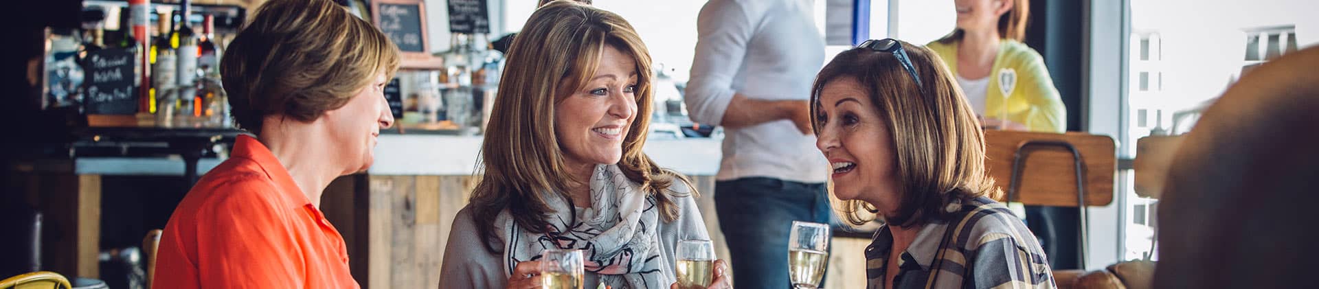 friends conversing at lunch - variable annuities