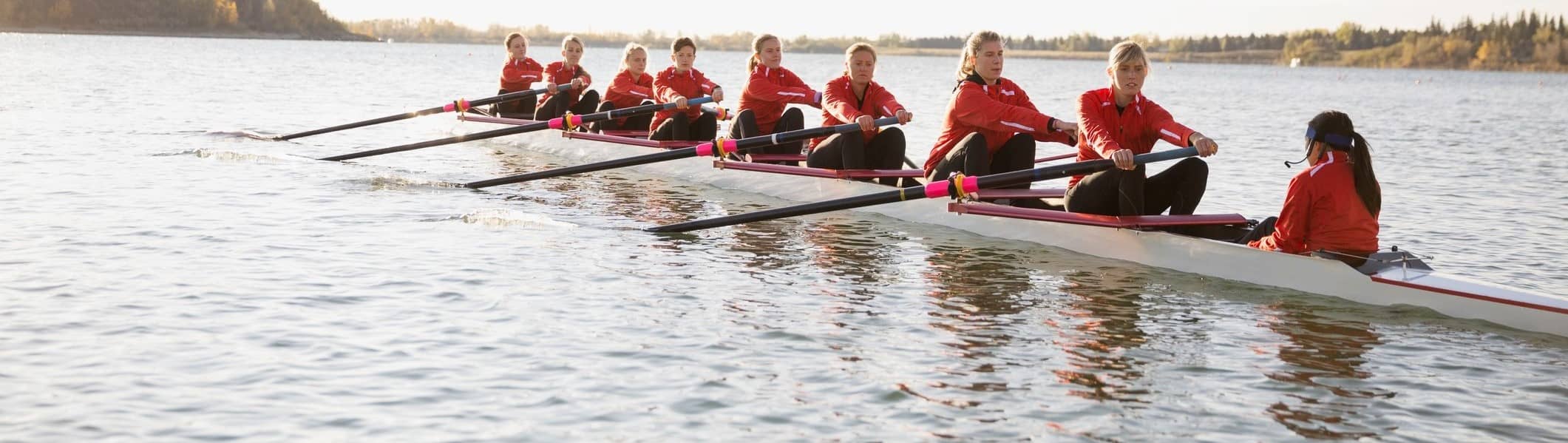 Team of women rowing