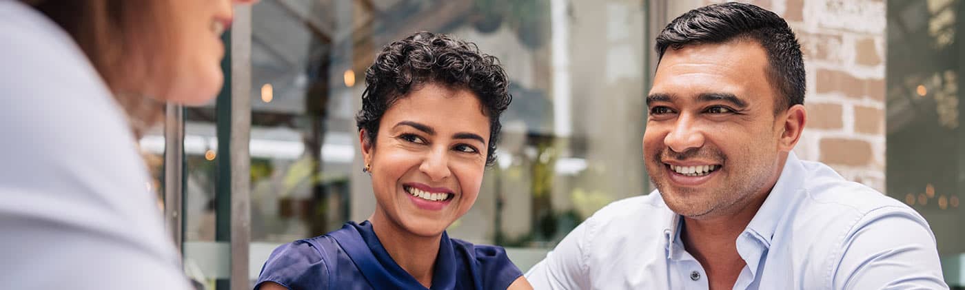Couple talking with an advisor