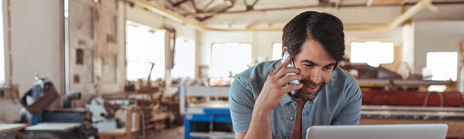 A bakery owner and employee walking through their new small business 401(k)
