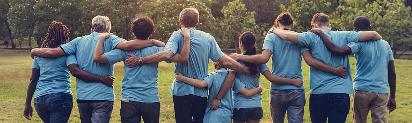 A group of volunteers doing charity work: charitable giving