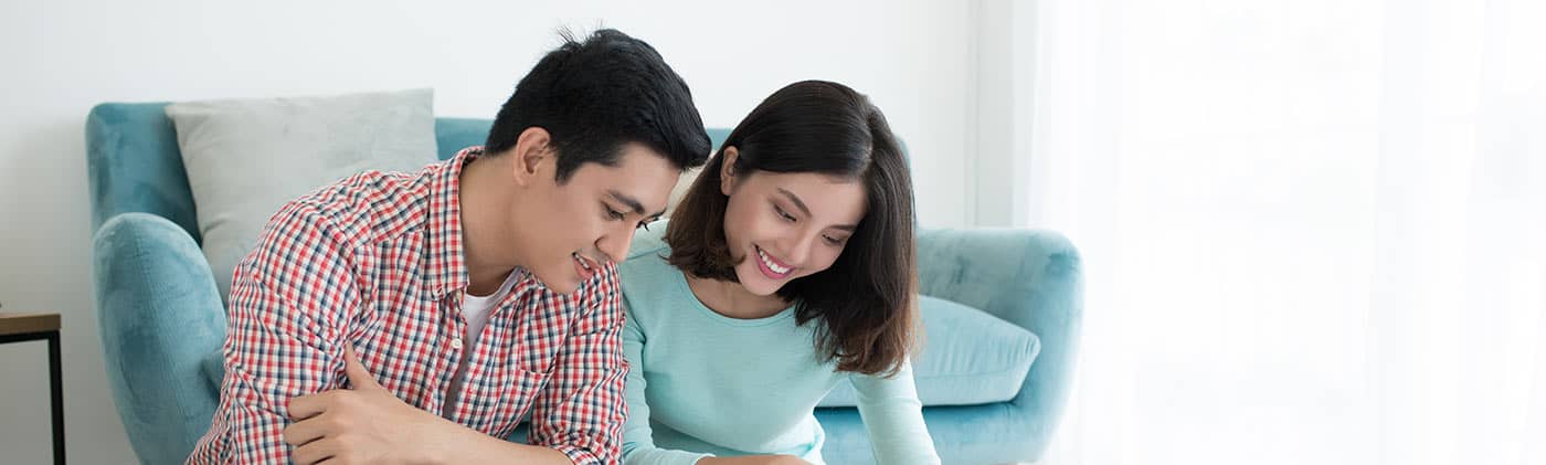 A young couple reviews their finances and asks, "How much money should you have saved by 30?" 