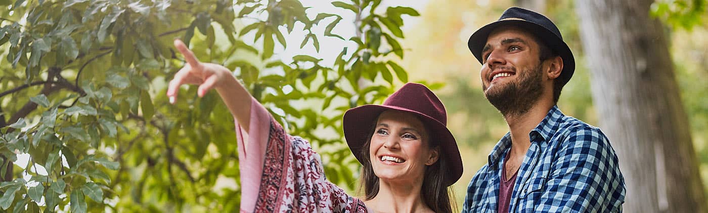 Young adults enjoying a vacation wonder, "How much do I need to retire at 45?"