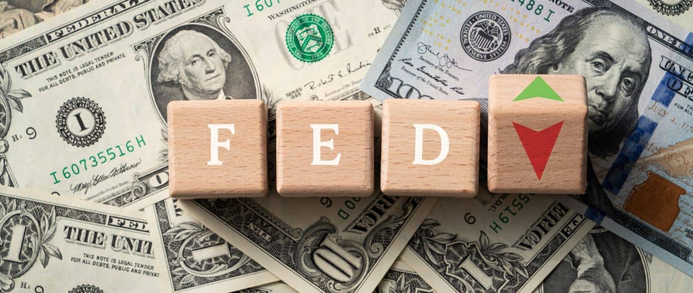 Wooden blocks with interest rate percent of bank with US dollars.