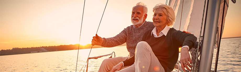A retired couple on a boat feeling confident about their finances and different types of investments 