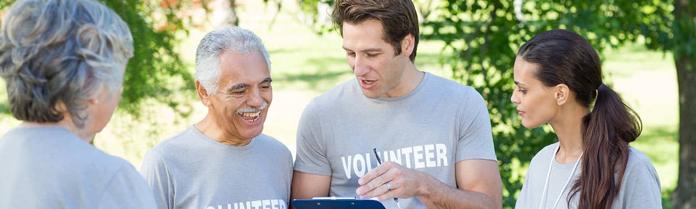 Group of volunteers meet to discuss today's agenda